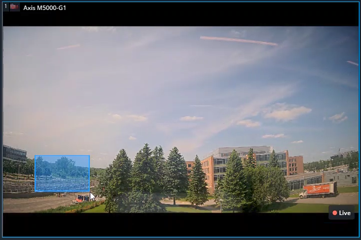 PTZ-Kamerakachel auf dem Genetec Operation Desktop mit dem Auswahlfeld für den blauen Bereichszoom.