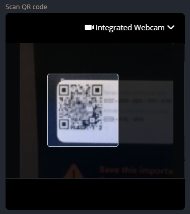 Cuadro de diálogo de Escanear código QR en Genetec Configuration web que muestra un código QR que se está escaneando.