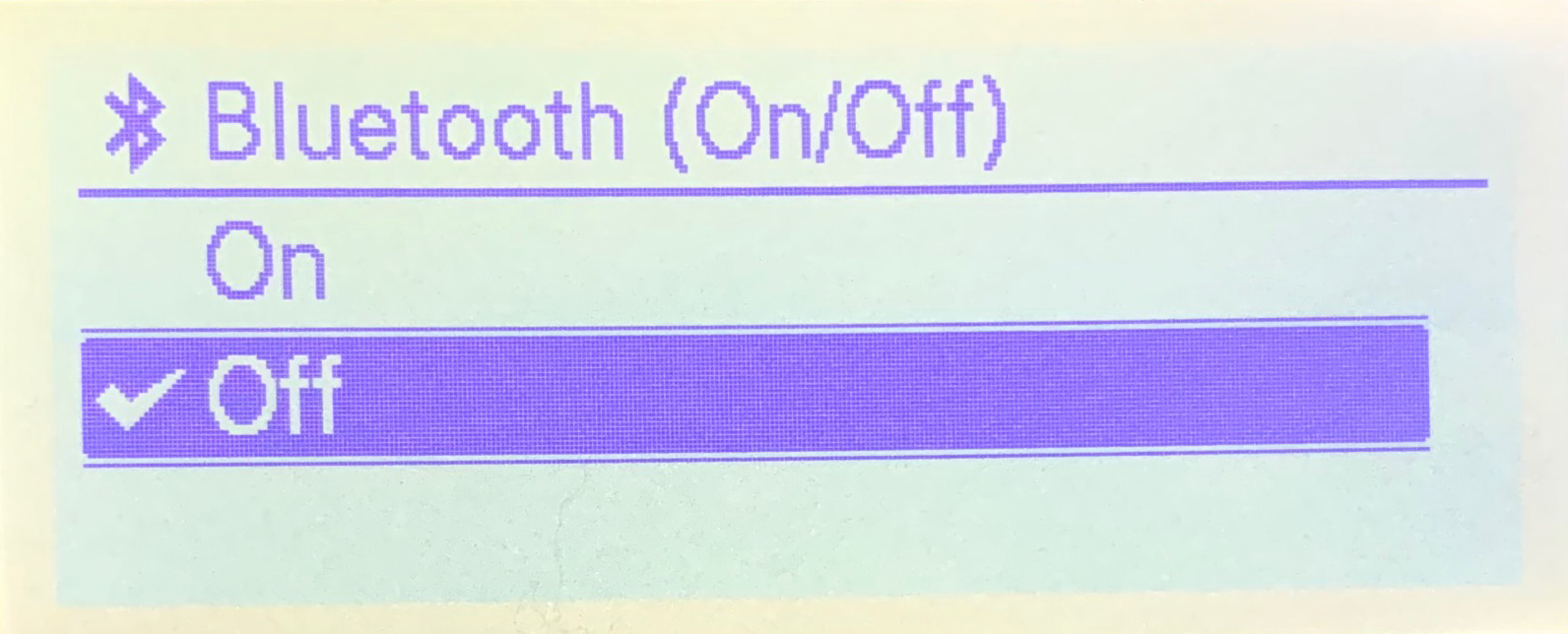 Brother TD-4550DNWB label printer LCD display Bluetooth menu with Bluetooth (ON/OFF) turned off.