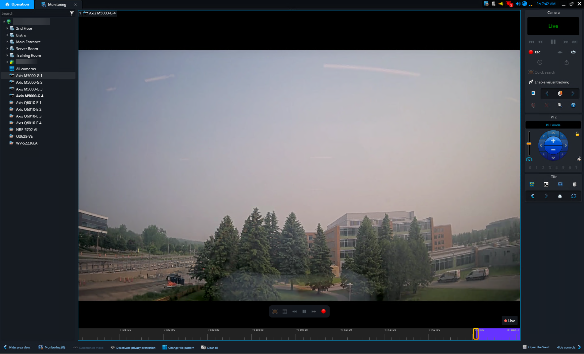Monitoring page in Genetec Operation desktop showing a PTZ camera feed in a tile and the PTZ widget in the sidebar.