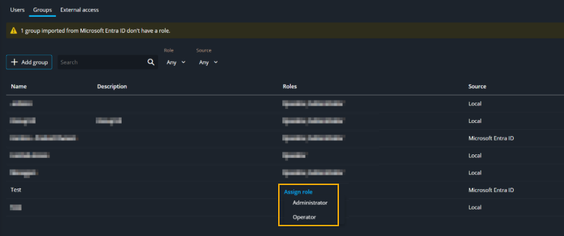 Groups tab in the Configuration task showing the assign role option and a group with no role assigned.