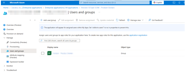 Microsoft Entra ID Users and groups page showing a list of users and groups.
